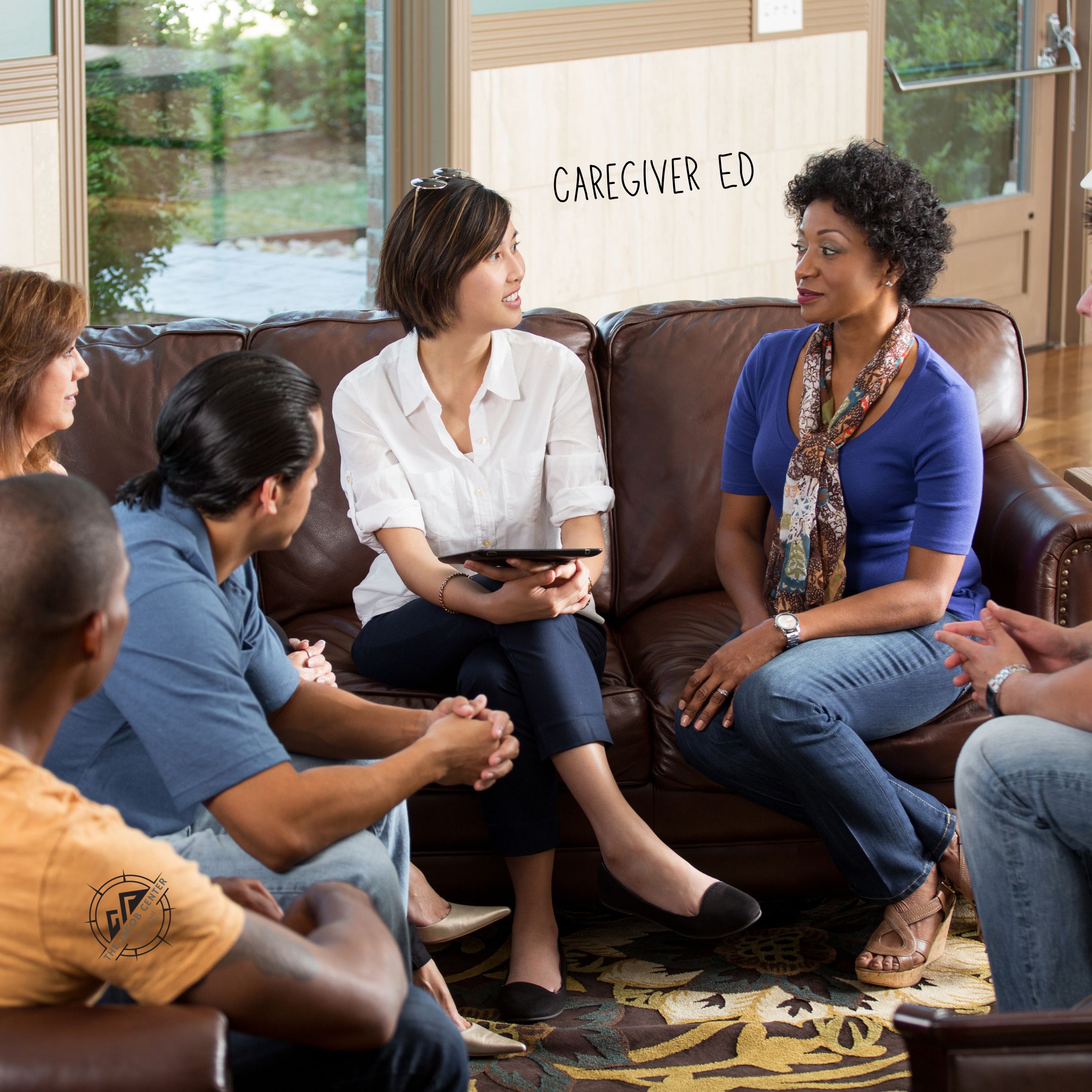 People sitting in caregiver ed class on couches